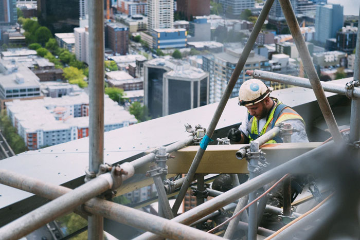 construction worker using rugged laptop