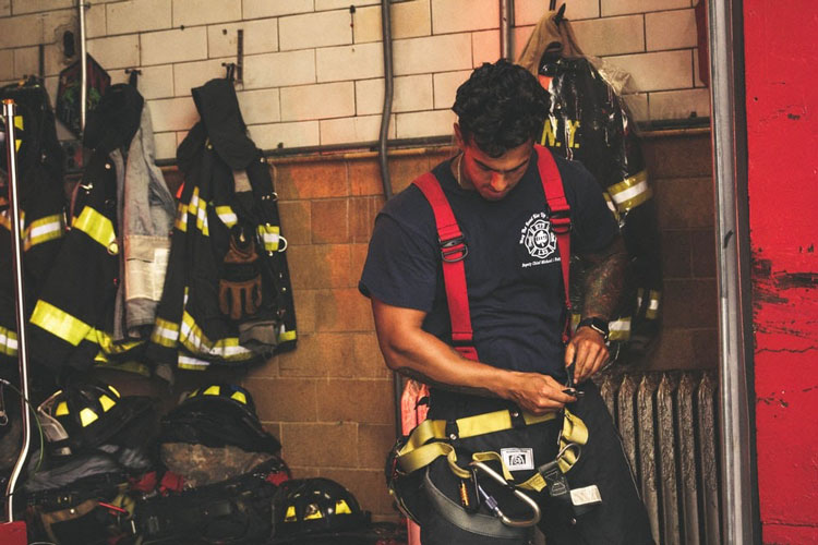 firefighter gearing up for incident response