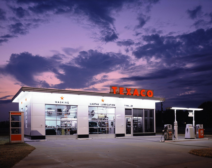 Exterior image of an auto repair shop at sundown