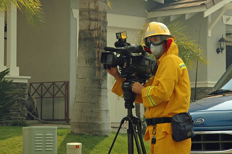 photographer wearing fire safety gear