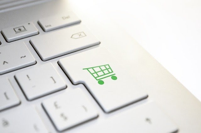 Keyboard with image of shopping cart to symbolize shopping for a rugged laptop computer