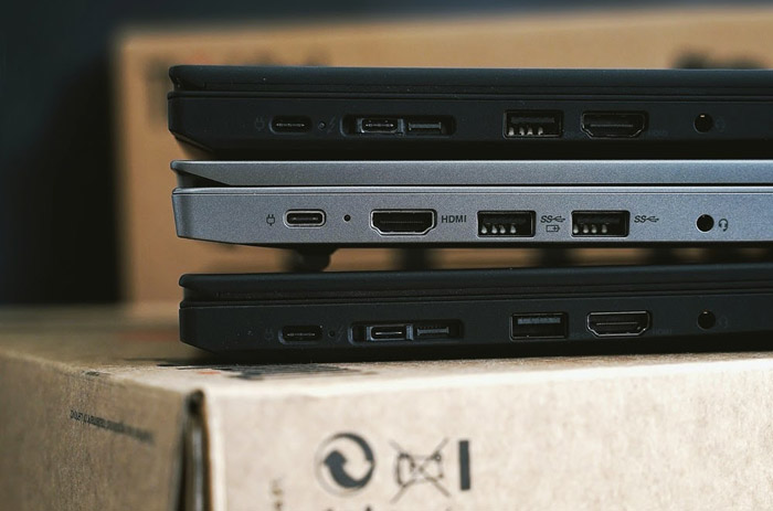 three stacked semi-rugged laptops